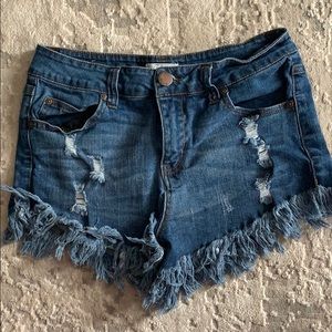 Ripped mid waisted jean shorts